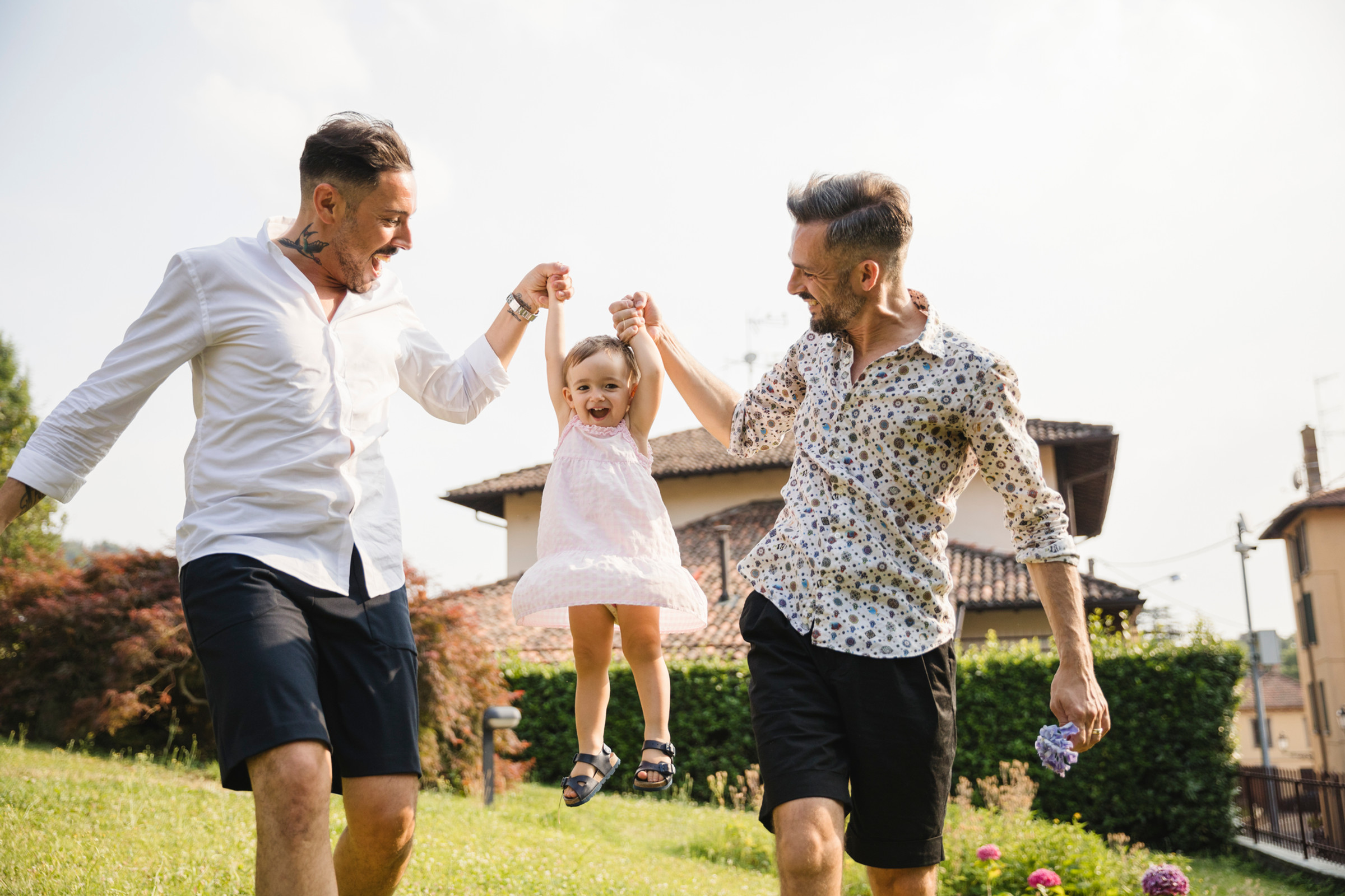 A same-sex couple with their daughter